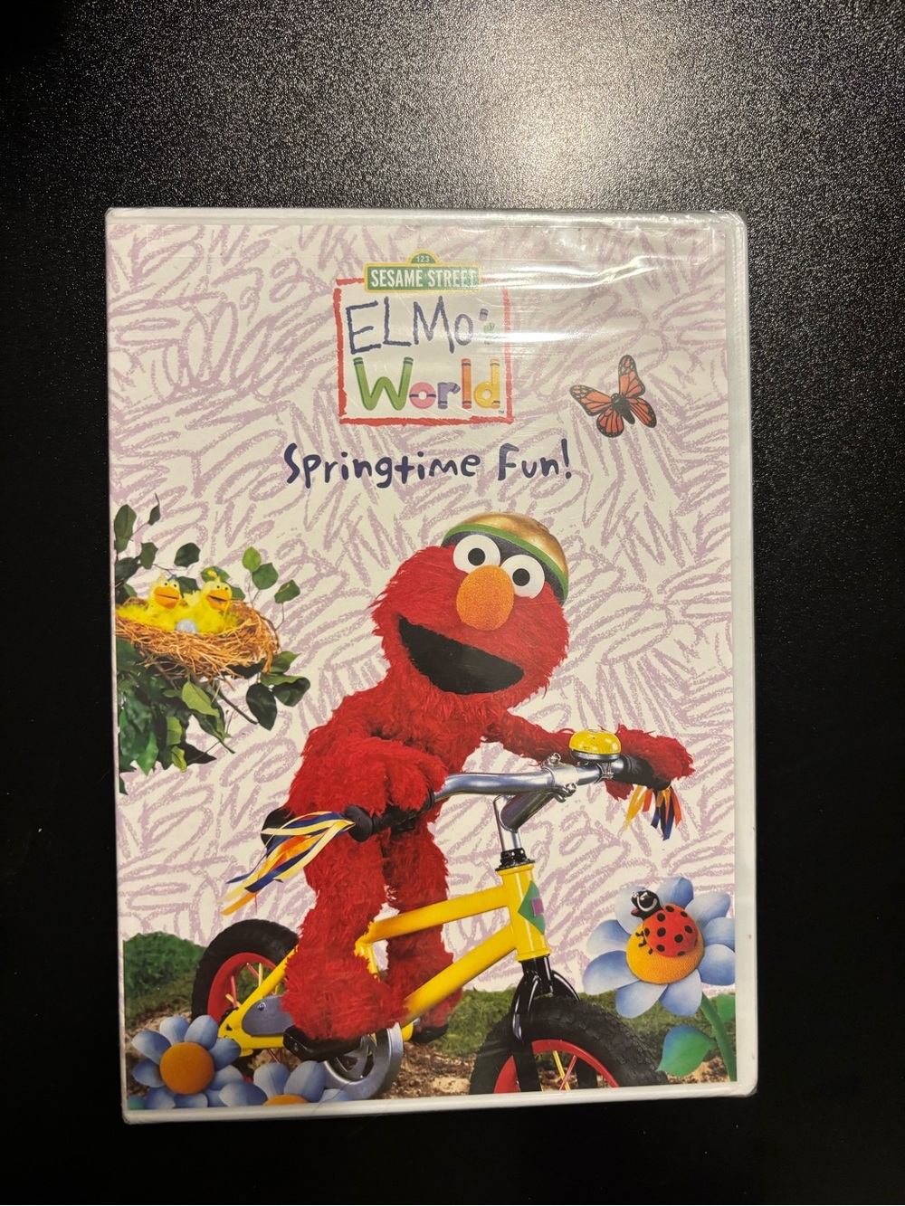 Sesame Street Elmo World Springtime Fun! DVD - Red Elmo, Yellow Bike